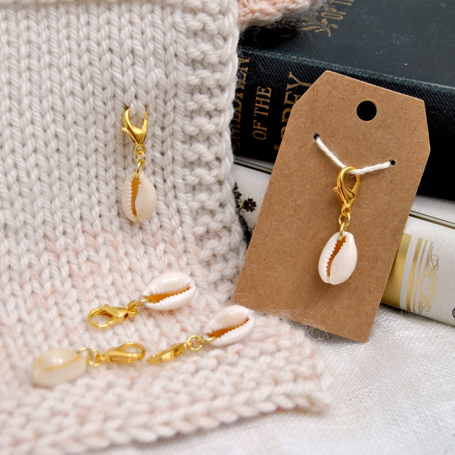 Natural cauri stitch marker
